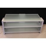 GLASS TV CABINET - a three shelf frosted glass tv cabinet measuring 18hx45wx18d. c2006.