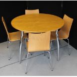 KITCHEN TABLE - a round kitchen table with chrome legs and four chairs. 110cm across.