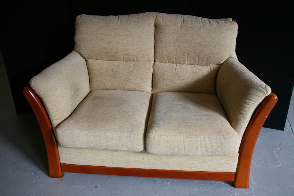 LOVE SEAT SOFA - a cream upholstered love seat sofa.