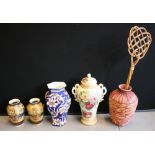 VASES - a collection of 4 vases, a decorative urn and a wicker carpet beater.