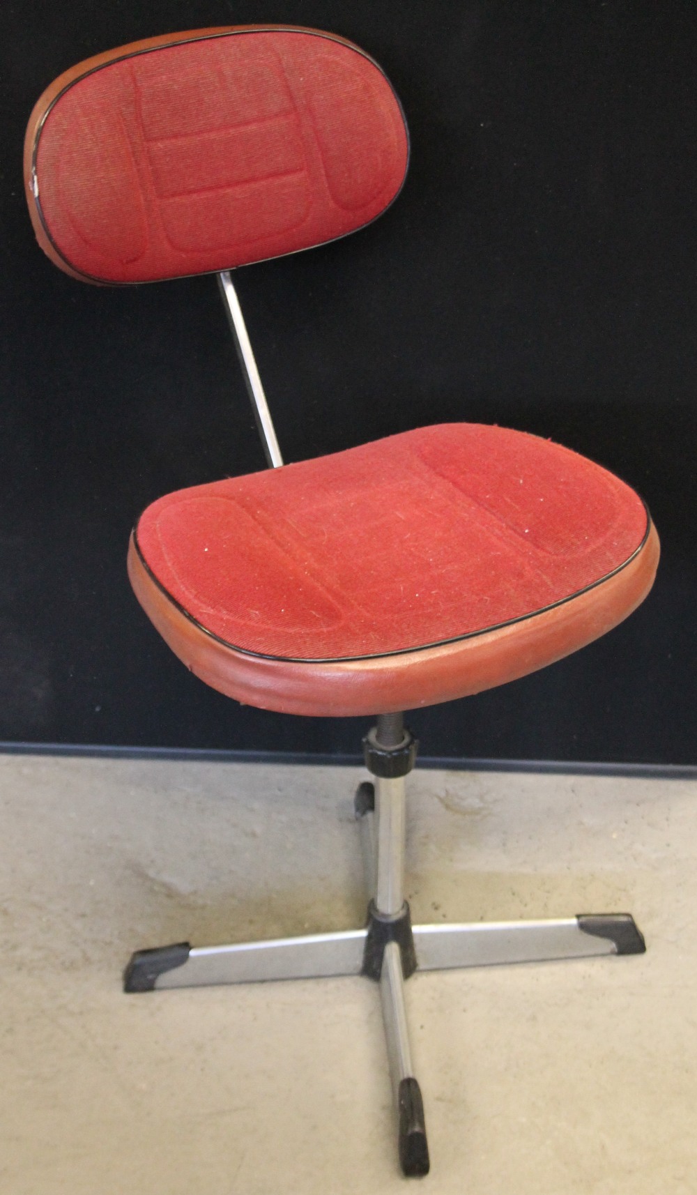 OFFICE CHAIR - a metal office chair in retro red fabric.