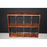 RECORD SHELVES - a simple wooden set of shelves with 8 compartments for record storage.