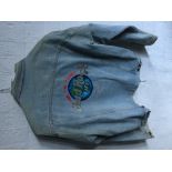 HARD ROCK CAFE - a denim jacket with 'Hard Rock Cafe - Beijing' embroidered on the reverse.