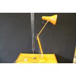 ANGLEPOISE LAMP - an orange anglepoise l