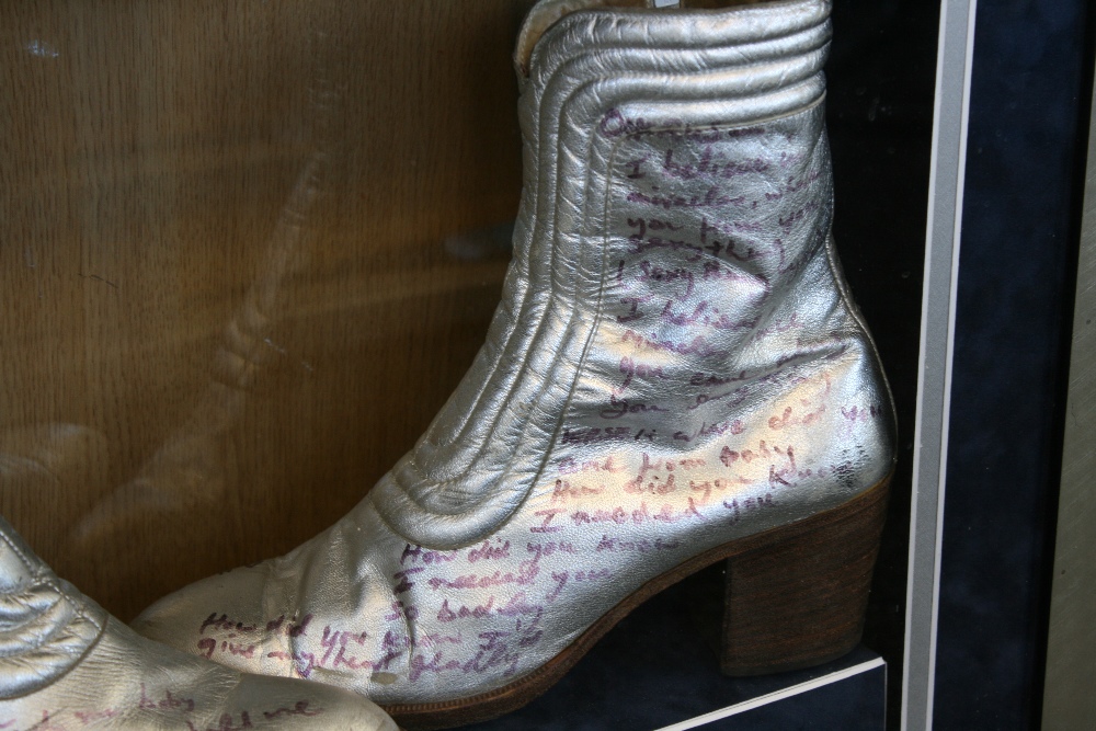 ERROL BROWN & HOT CHOCOLATE - a pair of Errol's silver platform boots which were worn by him whilst