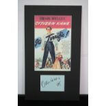 ORSON WELLES - a mounted print display of the Citizen Kane film poster and an autograph book sheet