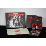SIN CITY - a collection of Sin City hand signed memorabilia to include a campaign book in the style