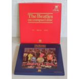 CD BOX SETS - 2 limited edition HMV 'The Beatles on Compact Disc' box sets to include 'Help,