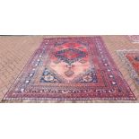 VINTAGE PERSIAN QASHQAI CARPET - a vintage Persian Qashqai carpet, measuring 305x206cm.