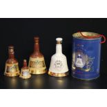 WHISKEY - BELLS - 5 bottles of Bells whiskey to include 3 Wade porcelain flasks and 2 commemorative