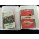 FOOTBALL PROGRAMMES & SIGNATURES - two folders filled with programmes and memorabilia from UK