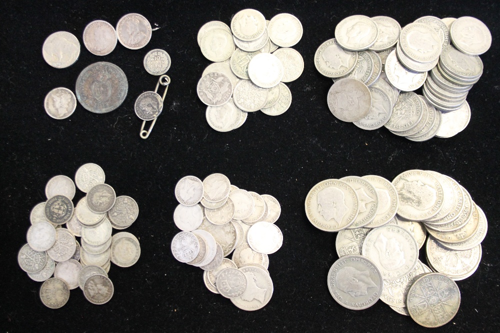 BRITISH SILVER COINS - a variety of coins pre 1947 to include florins, shillings,