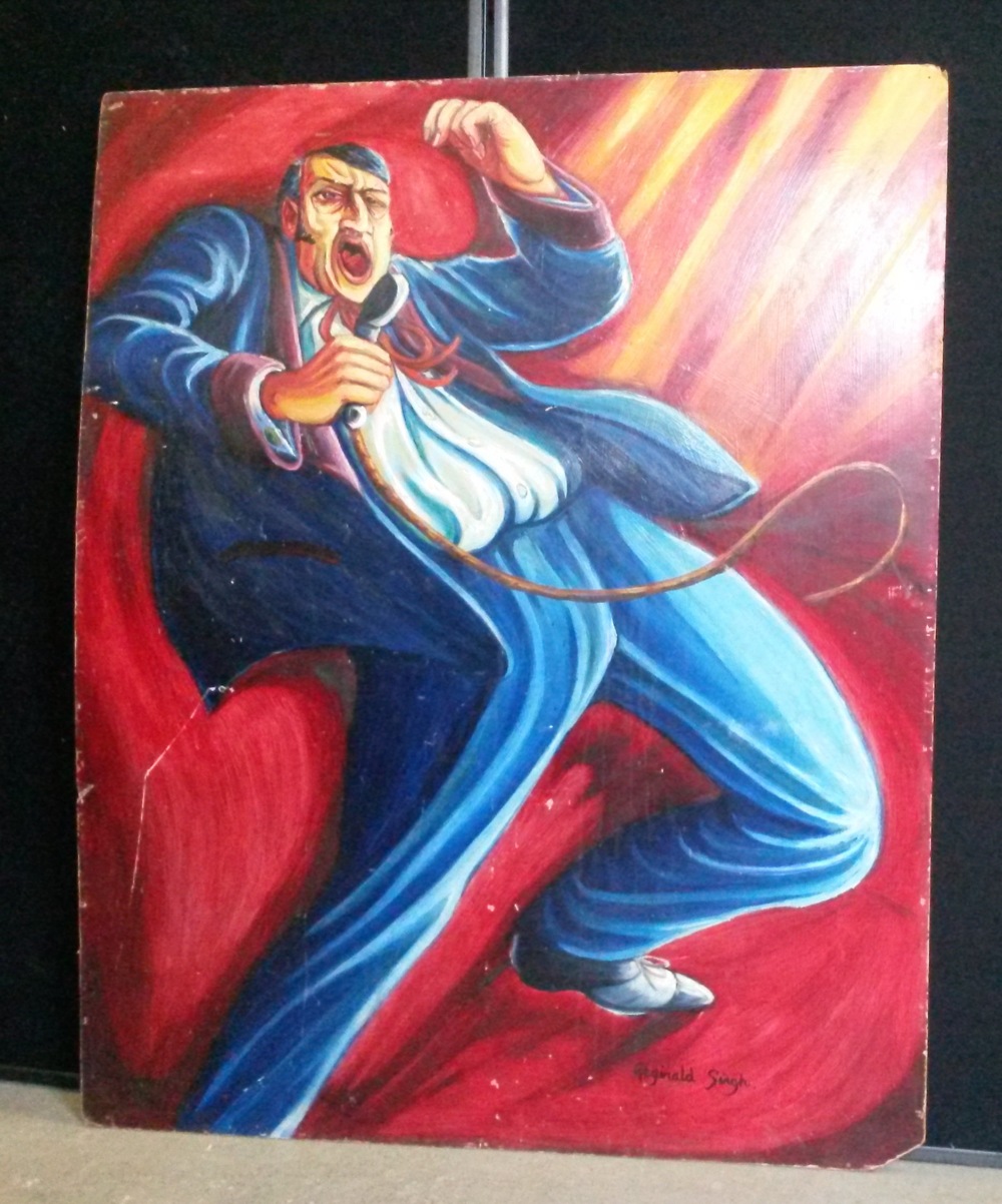 REGINALD SINGH - a caricature oil painting of Elvis Presley performing on stage by artist Reginald