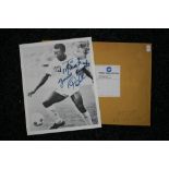 PELE SIGNED PHOTOGRAPH - a black and white signed photograph of the Brazilian footballer Pele