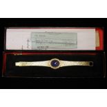 BUECHE-GIROD WATCH - an 18ct gold ladies watch on an 18ct gold bracelet with Lapis Lazuli dial.