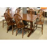 DINING ROOM TABLE - a sturdy wooden kitchen/dining room table with cut out motif to base and 6