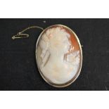 CAMEO BROOCH - a cameo brooch mounted on 14K gold. Measures approximately 6.1x4.