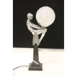 ART DECO LAMP - an art deco style lamp featuring a woman seated on top of a marble base,