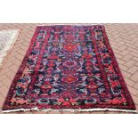 PERSIAN NAHAVAND RUG - a Persian Nahavand rug, measuring 216x132cm.