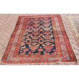 ANTIQUE PERSIAN FARAHAN RUG - an antique Persian Farahan rug, measuring approximately 173x122cm.