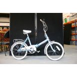 UNIVERSAL BICYCLE - a light blue classic ladies bicycle by Universal, Raleigh Essex.