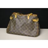 LOUIS VUITTON: a monogrammed handbag with internal zipped compartment, width approx 36cm,