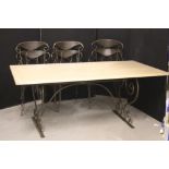 WROUGHT IRON DINING TABLE - a wooden dining table with wrought iron legs and 6 matching chairs with