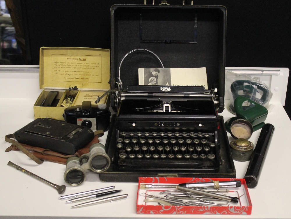 TYPEWRITER & DESK EQUIPMENT - a Royal portable typewriter with instructions, hole punches,