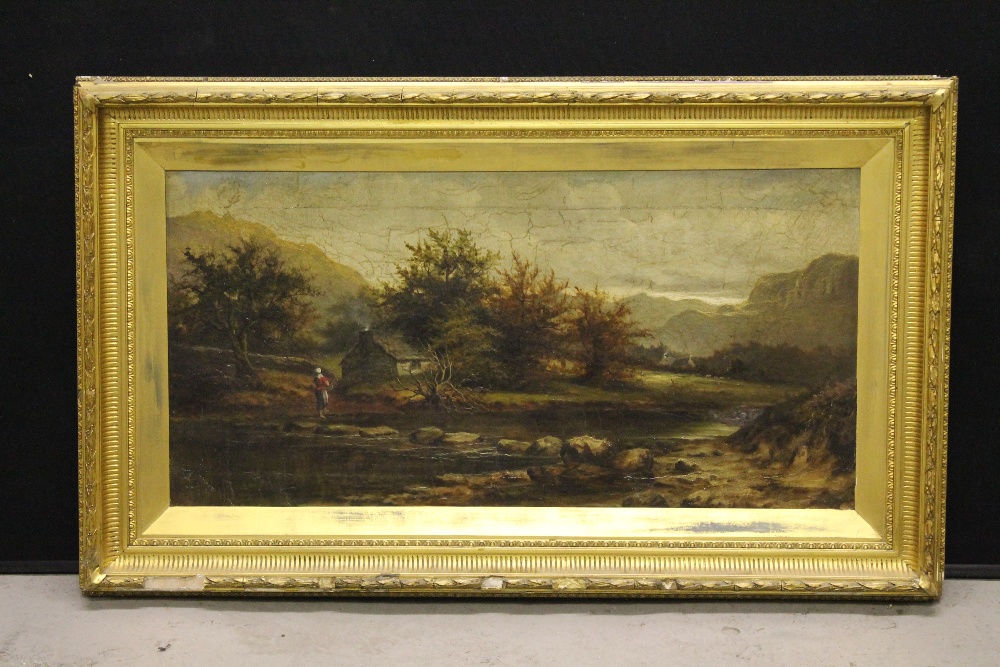 OIL PAINTING - a gilt framed oil on canvas featuring a country scene with cottage and young woman.