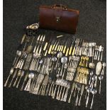 EPNS CUTLERY - a briefcase filled with EPNS and stainless steel items to include gravy jugs,