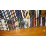 Shelf of assorted CDs