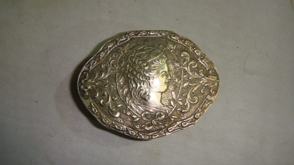 Continental lozenge shaped silver box with repousse work decoration of a Lady with gilded interior