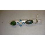 4 x modern silver metal rings set with semi precious hardstones