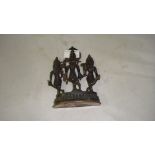 Indian patinated bronze figure group of Deity with two followers