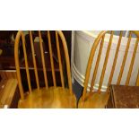 Set of four stick back Ercol style chairs