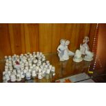 Assorted thimbles and decorative figures