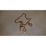 9 ct rose gold watch chain mounted with a keepsake locket 42 cms 31 g