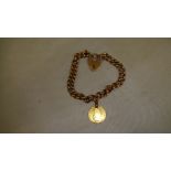 9 ct gold open link bracelet with heart shape clasp and George III Half Guinea low grade and holed