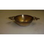 Vintage foreign silver wine taster with scallop shape handle stamped .