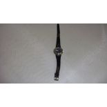 Retro ladies Omega Dynamic wristwatch with leather strap stamped Tool 102 Waterproof on reverse