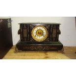 Early 20th century faux wood metal cased mantle clock