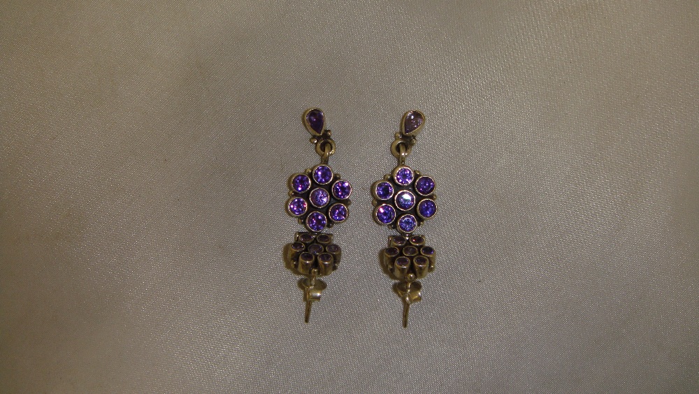 Pair of modern silver and purple stone cluster earrings