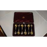 Set of six foreign silver and silver gilt teaspoons modelled as sailing ships with London import