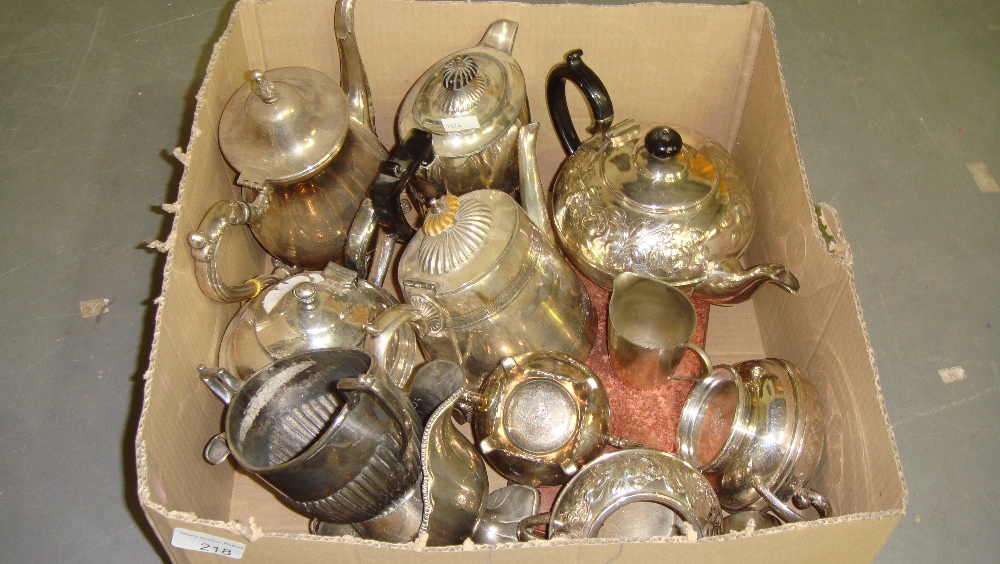 Box of vintage silver plated tea pots etc.