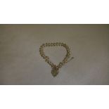 Silver open link bracelet with heart shaped padlock clasp