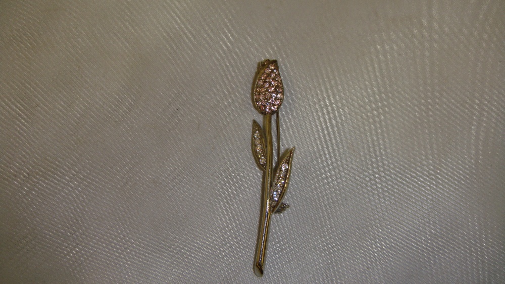 20th century silver brooch modelled as a rose set with pink stones