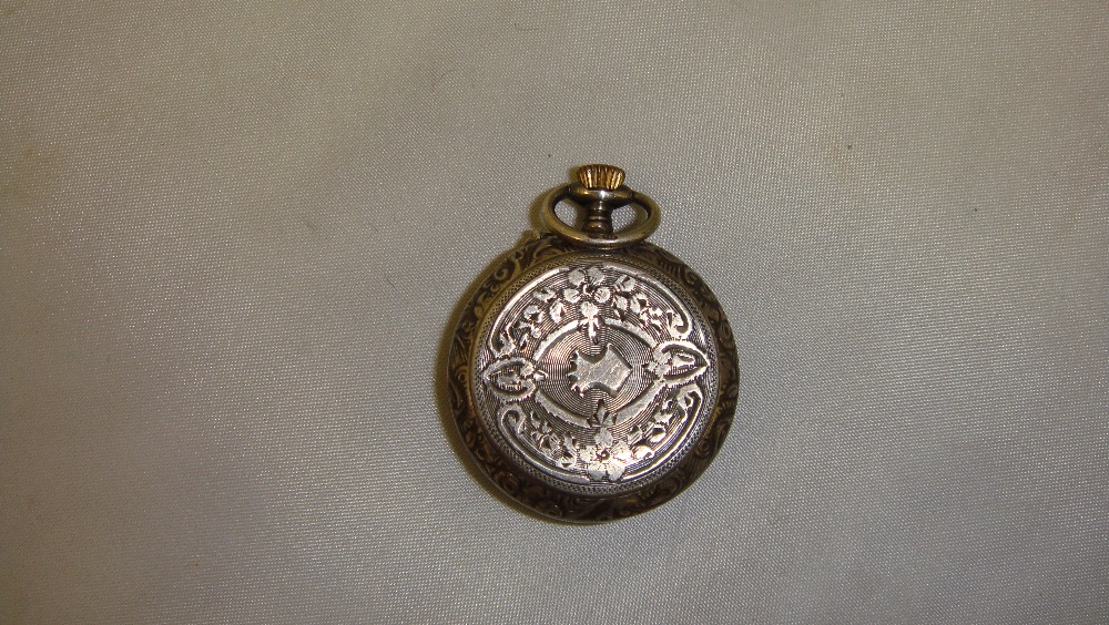 Late 19th / early 20th century ladies pocket with painted dial in chased and engraved silver case - Image 2 of 2