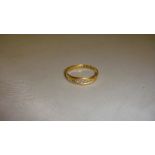 18 ct yellow gold ring set with five graduated diamonds