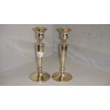 Pair of filled silver candlesticks Sheffield by Walker & Hall date marked rubbed