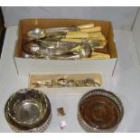 Box of assorted silver plated cutlery, fisheaters, wine coasters etc.